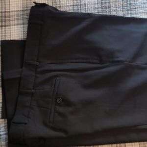 Perry Ellis men's pleated black dress pants.